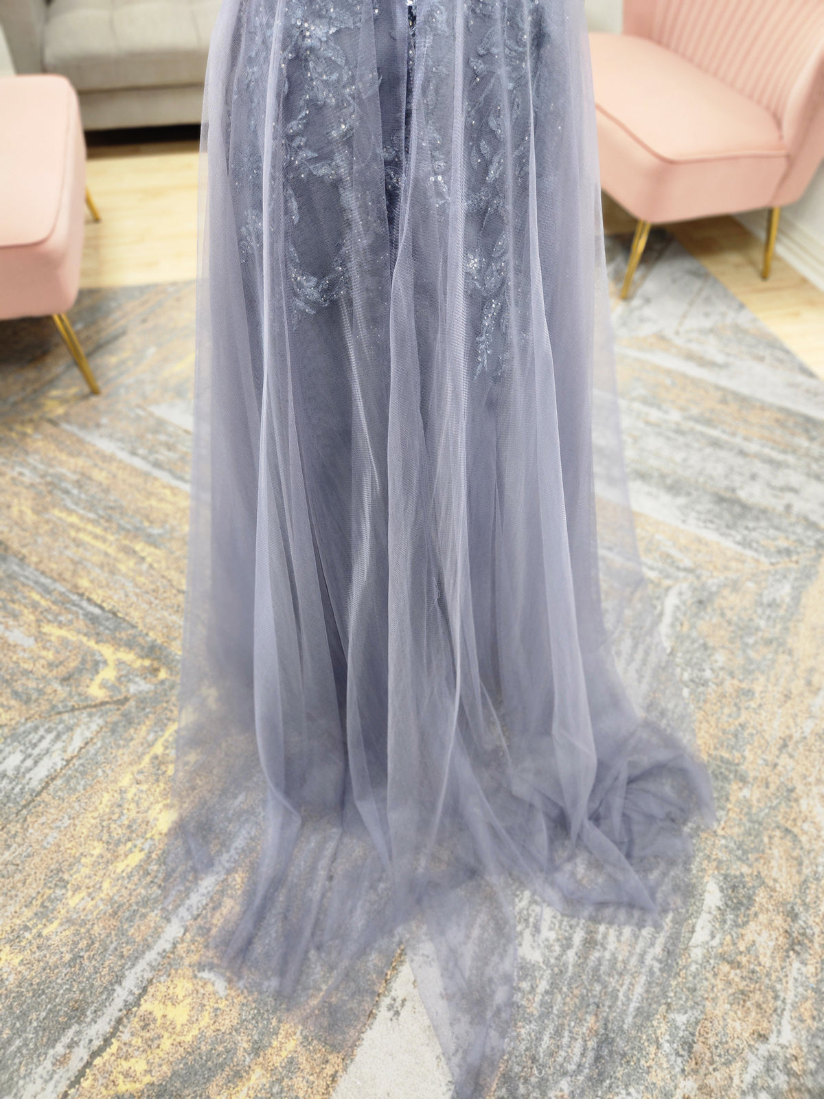 Morilee MGNY 72834 off-the-shoulder mother of the bride gown with embroidered lace bodice, sheer sleeves, and flowing A-line skirt with detachable overskirt.