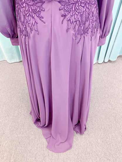 Morilee MLNY 72717 plus size A-line mother of the bride dress on mannequin with draped V-neckline, sheer bishop sleeves, beaded lace appliques at the shoulders and waist, and flowing chiffon skirt with sweep train