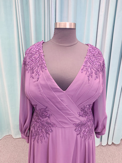 Morilee MLNY 72717 plus size A-line mother of the bride dress on mannequin with draped V-neckline, sheer bishop sleeves, beaded lace appliques at the shoulders and waist, and flowing chiffon skirt with sweep train
