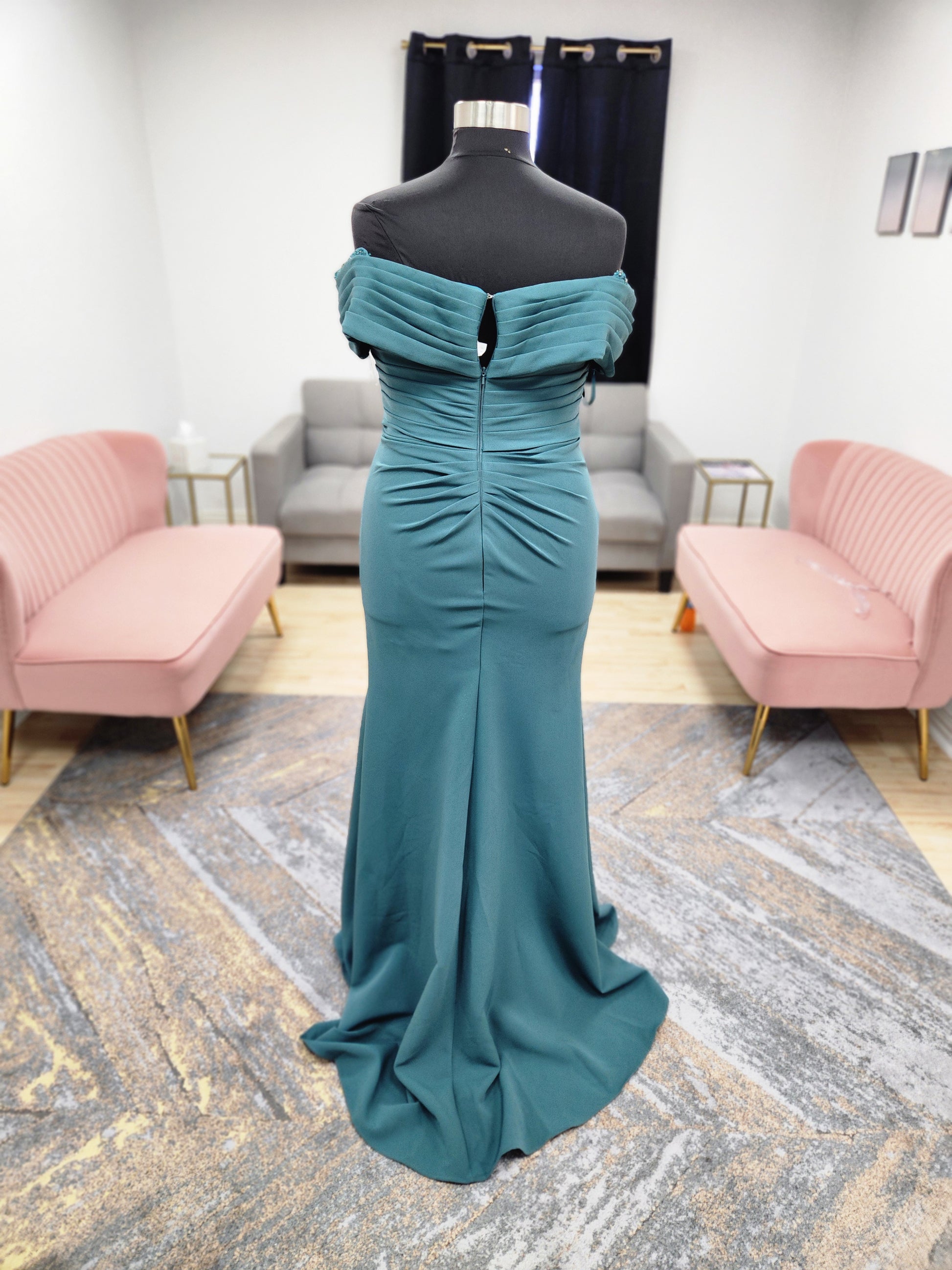 Morilee MGNY 72827 off-the-shoulder scuba crepe mother of the bride gown with draped bodice, cascading ruffle slit, and fitted mermaid silhouette.