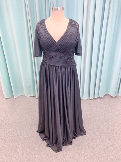 Morilee MLNY 73102 plus size A-line mother of the bride dress on mannequin with asymmetrically draped V-neck bodice, flutter sleeves, embroidered beaded appliques, and shimmer mesh A-line skirt