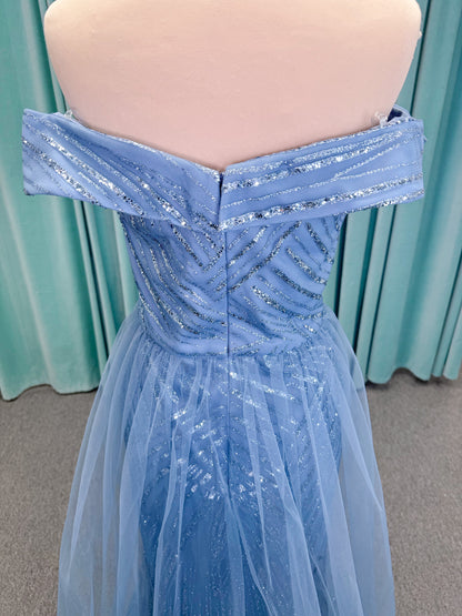 Morilee MLNY 73110 mermaid mother of the bride dress on mannequin with off-the-shoulder sweetheart neckline with foldover cuff, sequin-beaded net bodice, sheer tulle back panel, and sweep train