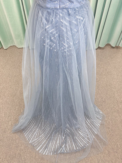 Morilee MLNY 73110 mermaid mother of the bride dress on mannequin with off-the-shoulder sweetheart neckline with foldover cuff, sequin-beaded net bodice, sheer tulle back panel, and sweep train