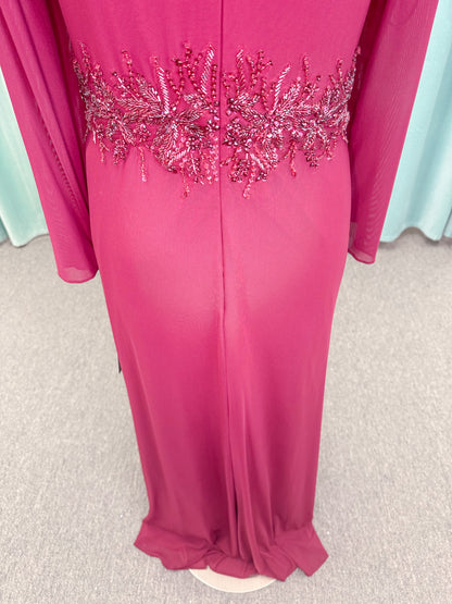 Morilee MLNY 73175 fit and flare mother of the bride dress on mannequin with draped V-neckline, long sleeves, beaded appliques, beaded waist, and slit skirt