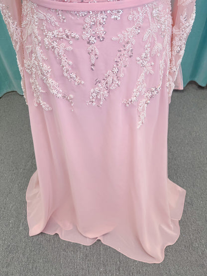  Morilee MLNY 73185 plus size A-line mother of the bride dress on mannequin with square neckline, draped chiffon bodice, sheer illusion long sleeves, beaded appliques, detachable self-belt, and flowing A-line skirt