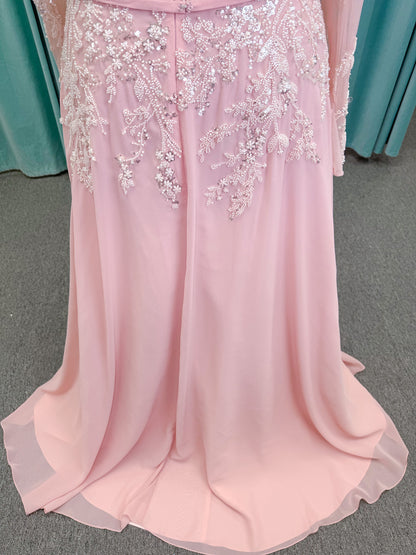  Morilee MLNY 73185 plus size A-line mother of the bride dress on mannequin with square neckline, draped chiffon bodice, sheer illusion long sleeves, beaded appliques, detachable self-belt, and flowing A-line skirt