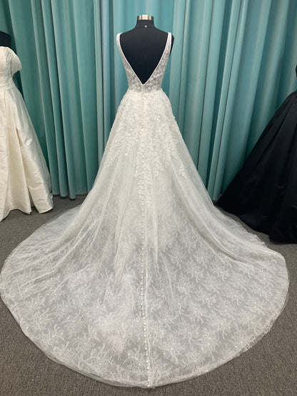 Morilee Style 2736 botanical A-line wedding dress with plunging v-neckline, beaded trim, 3D embroidered lace over Chantilly lace, and open v-back