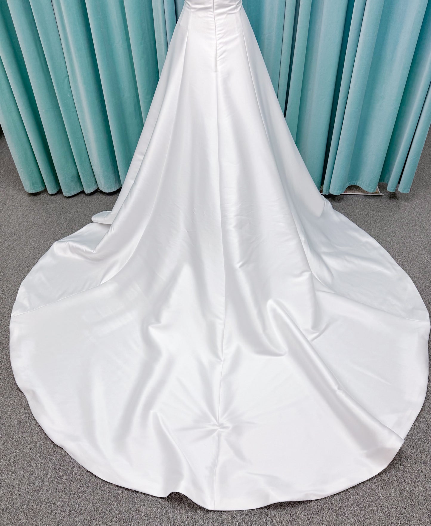 Strapless A-line wedding dress with a scoop neckline, structured drop-waist bodice, clean princess seams, and smooth full skirt.