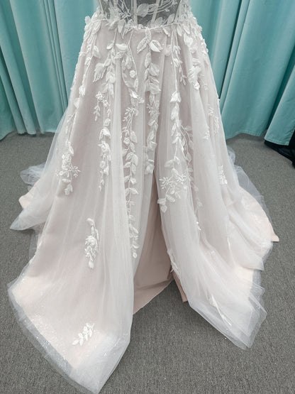 Amaryllis A-line Wedding Dress in Ivory/Cashmere, Size 12 — shimmering layered tulle, floral appliqués, soft romantic skirt