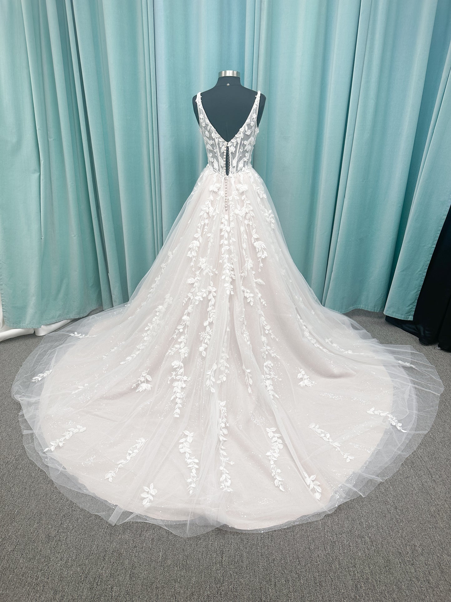 Amaryllis A-line Wedding Dress in Ivory/Cashmere, Size 12 — shimmering layered tulle, floral appliqués, soft romantic skirt