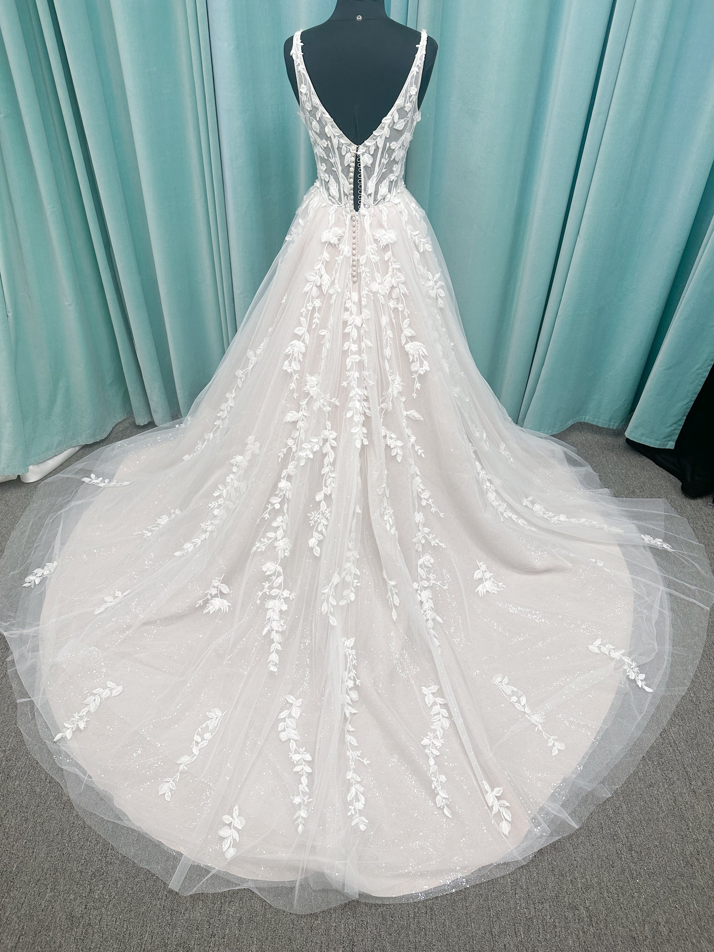Amaryllis A-line Wedding Dress in Ivory/Cashmere, Size 12 — shimmering layered tulle, floral appliqués, soft romantic skirt