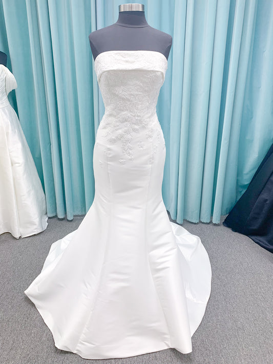 Morilee 2905 Atalanta fit and flare wedding dress in stretch Mikado with fold-over strapless neck, beaded lace bodice, and detachable double-loop embellished bow.