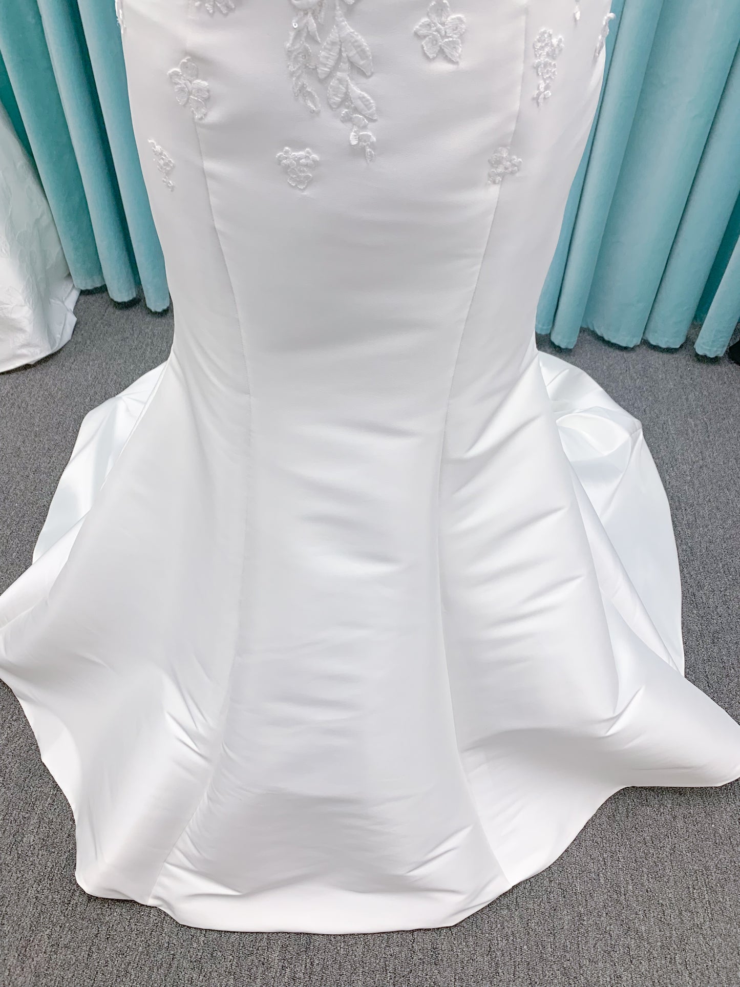 Morilee 2905 Atalanta fit and flare wedding dress in stretch Mikado with fold-over strapless neck, beaded lace bodice, and detachable double-loop embellished bow.