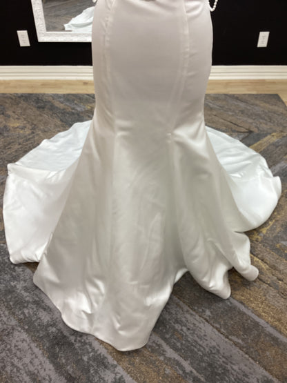  Morilee Atete wedding dress style 2921, a satin fit and flare bridal gown with a strapless scoop neckline and detachable pearl drape.