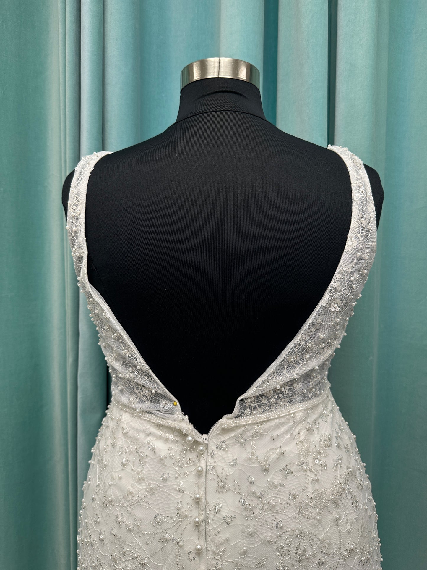 Plus size beaded lace column wedding dress with plunging V neckline, illusion tulle inset, and low V back by Stella York Style 8006