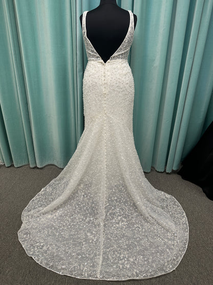 Plus size beaded lace column wedding dress with plunging V neckline, illusion tulle inset, and low V back by Stella York Style 8006
