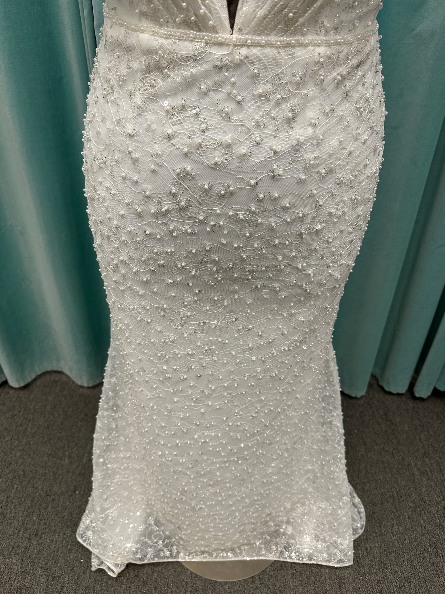 Plus size beaded lace column wedding dress with plunging V neckline, illusion tulle inset, and low V back by Stella York Style 8006