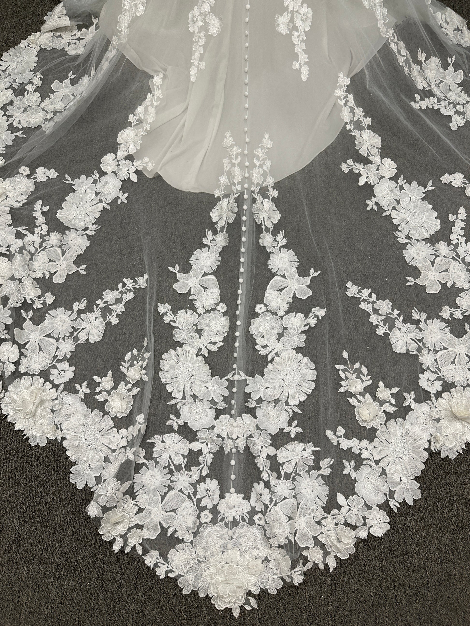 Essense of Australia D4141 lace fit-and-flare wedding dress with high illusion neckline, sheer bodice, low keyhole back, and shaped lace train