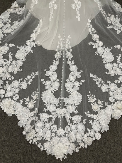 Essense of Australia D4141 lace fit-and-flare wedding dress with high illusion neckline, sheer bodice, low keyhole back, and shaped lace train