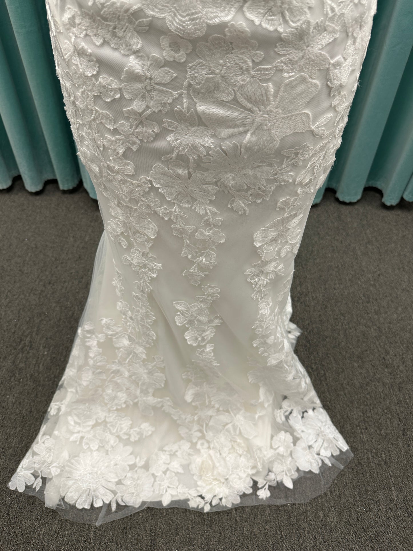 Essense of Australia D4141 lace fit-and-flare wedding dress with high illusion neckline, sheer bodice, low keyhole back, and shaped lace train