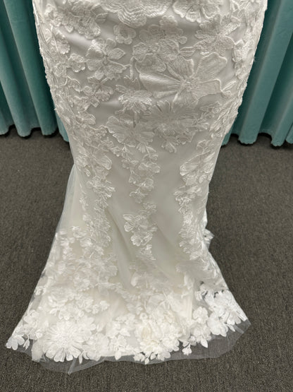 Essense of Australia D4141 lace fit-and-flare wedding dress with high illusion neckline, sheer bodice, low keyhole back, and shaped lace train