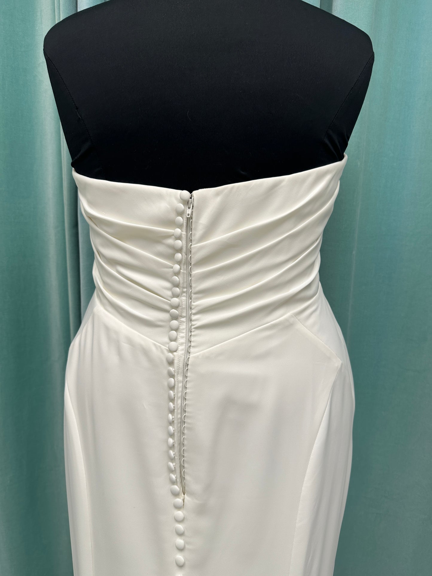 Strapless satin fit-and-flare wedding dress with sweetheart neckline and button-back detail by Essense of Australia style D4193
