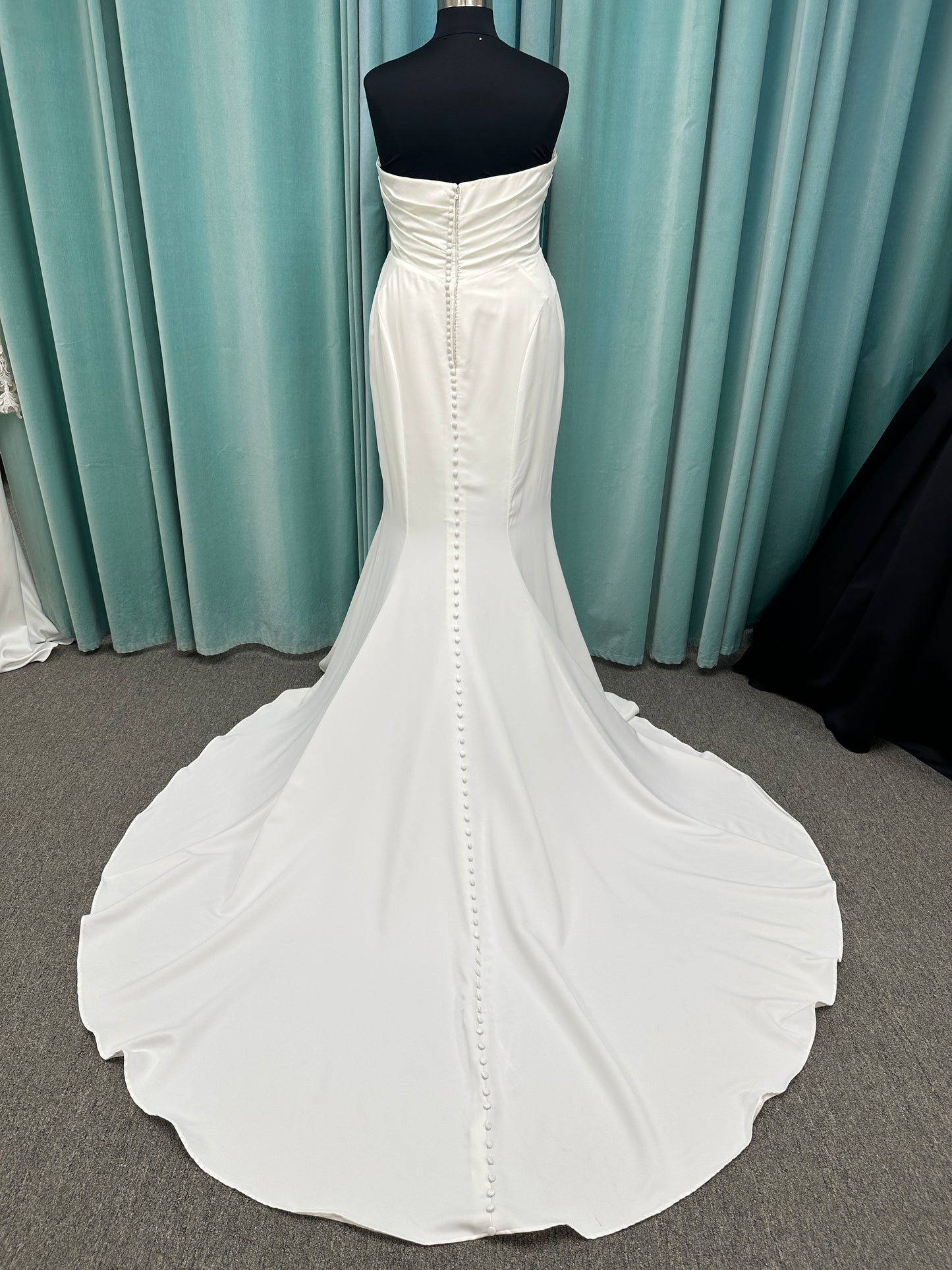 Strapless satin fit-and-flare wedding dress with sweetheart neckline and button-back detail by Essense of Australia style D4193