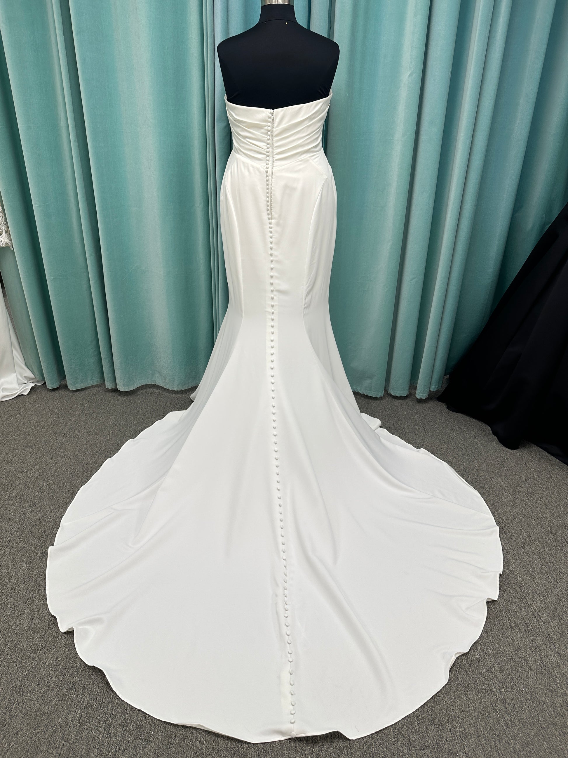 Strapless satin fit-and-flare wedding dress with sweetheart neckline and button-back detail by Essense of Australia style D4193