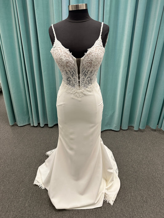 Essense of Australia D4181 column wedding dress with plunging V-neckline, pearl straps, lace bodice, and sleek crepe skirt with lace train