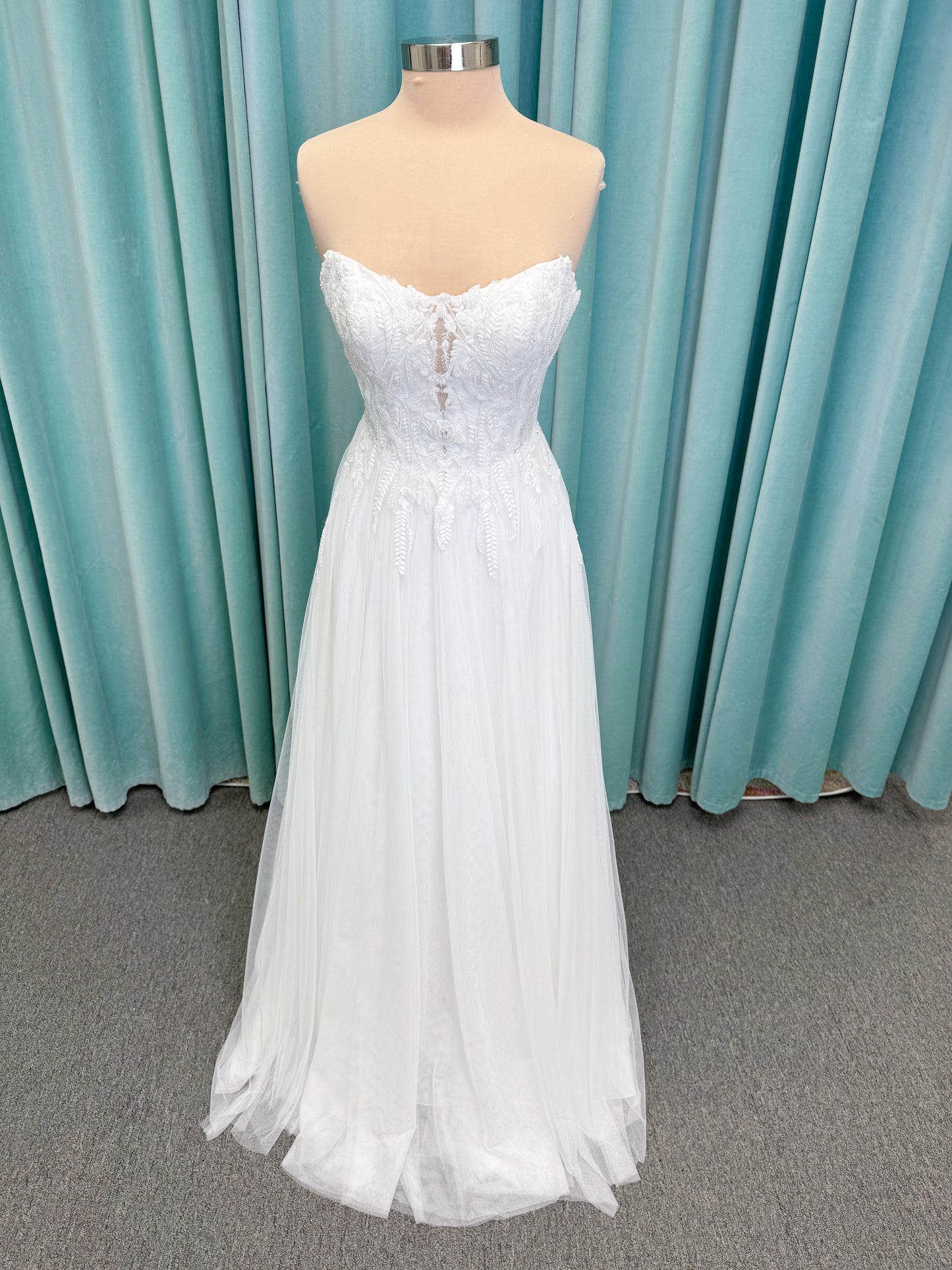 Carolyn A-line Wedding Dress in Ivory, Size 8 — strapless bodice, lace appliqués, beaded details, tulle skirt