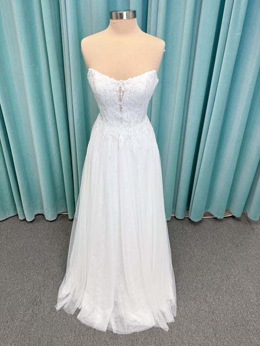 Carolyn A-line Wedding Dress in Ivory, Size 8 — strapless bodice, lace appliqués, beaded details, tulle skirt