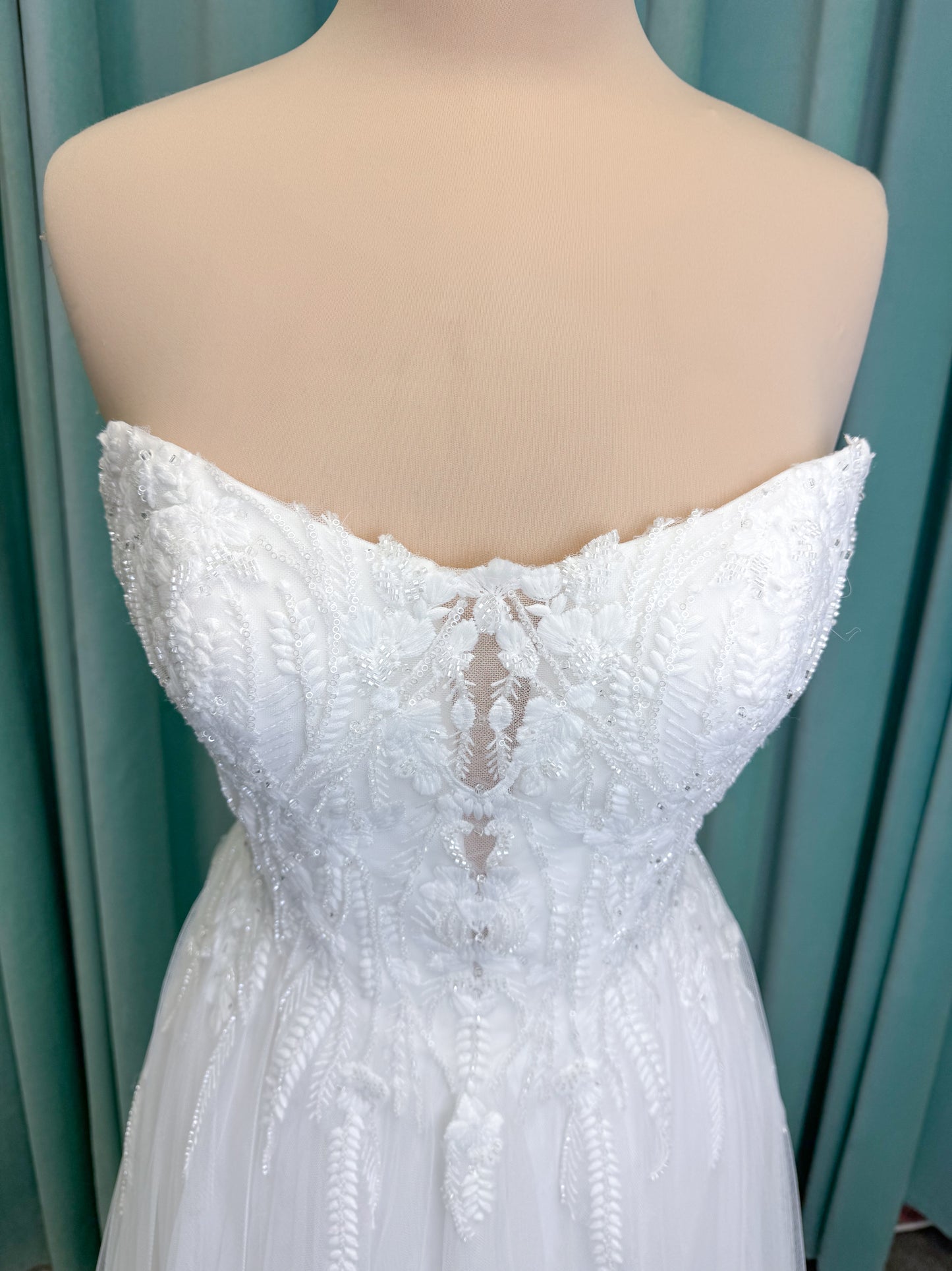 Carolyn A-line Wedding Dress in Ivory, Size 8 — strapless bodice, lace appliqués, beaded details, tulle skirt