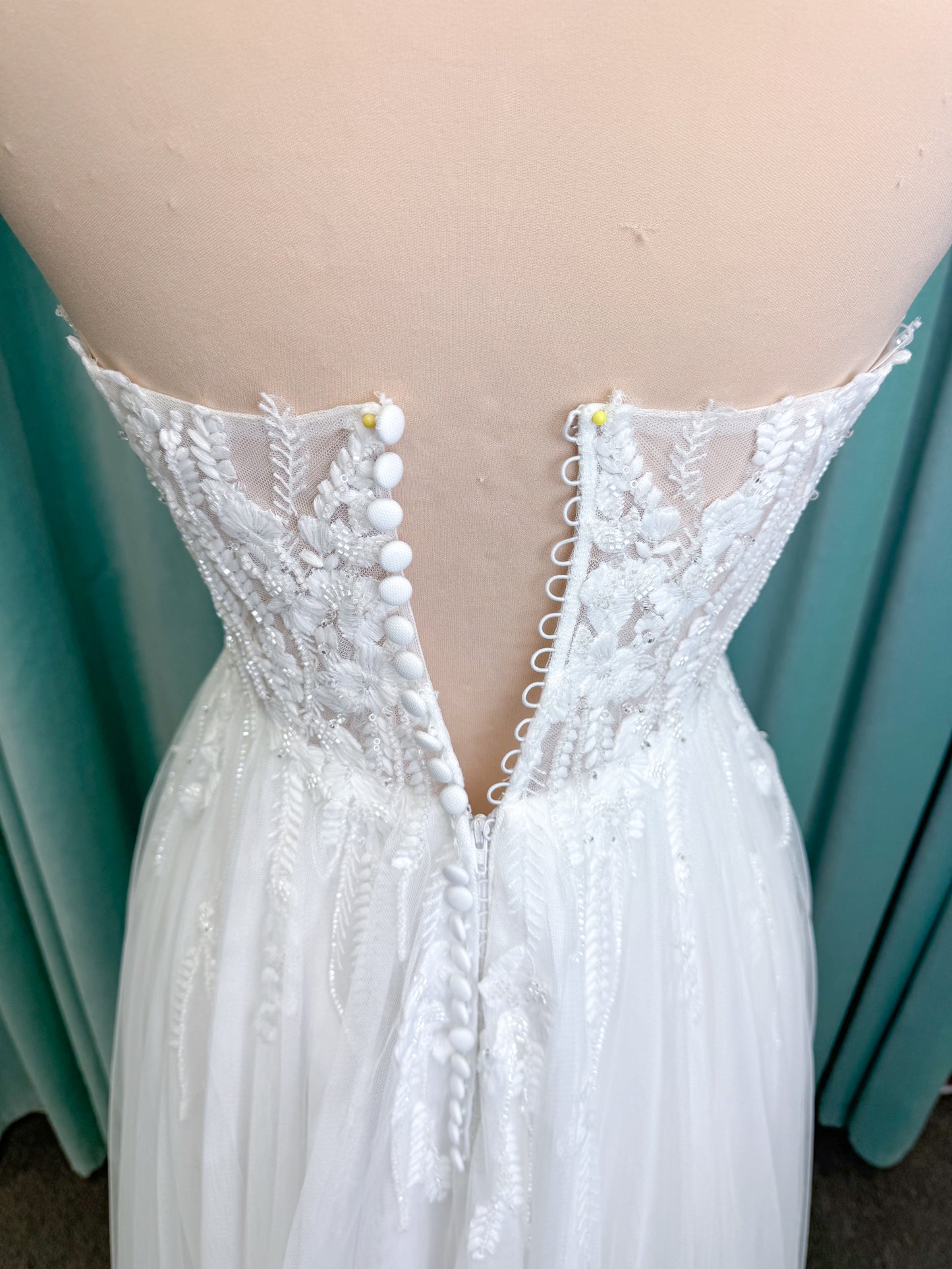 Carolyn A-line Wedding Dress in Ivory, Size 8 — strapless bodice, lace appliqués, beaded details, tulle skirt