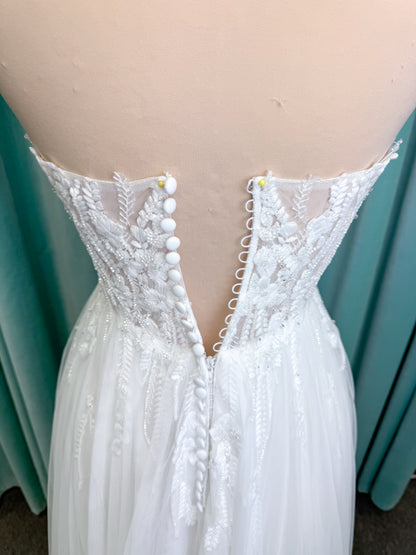 Carolyn A-line Wedding Dress in Ivory, Size 8 — strapless bodice, lace appliqués, beaded details, tulle skirt