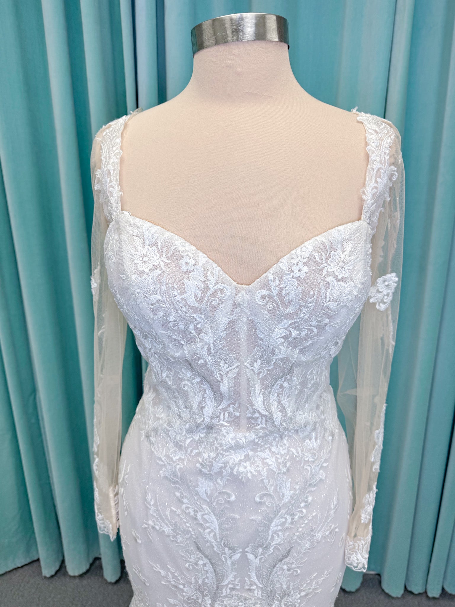 Morilee 2401 Dauphine strapless sweetheart mermaid wedding dress in sparkle organza with frosted lace appliqués, corset bodice, and detachable illusion long sleeves.