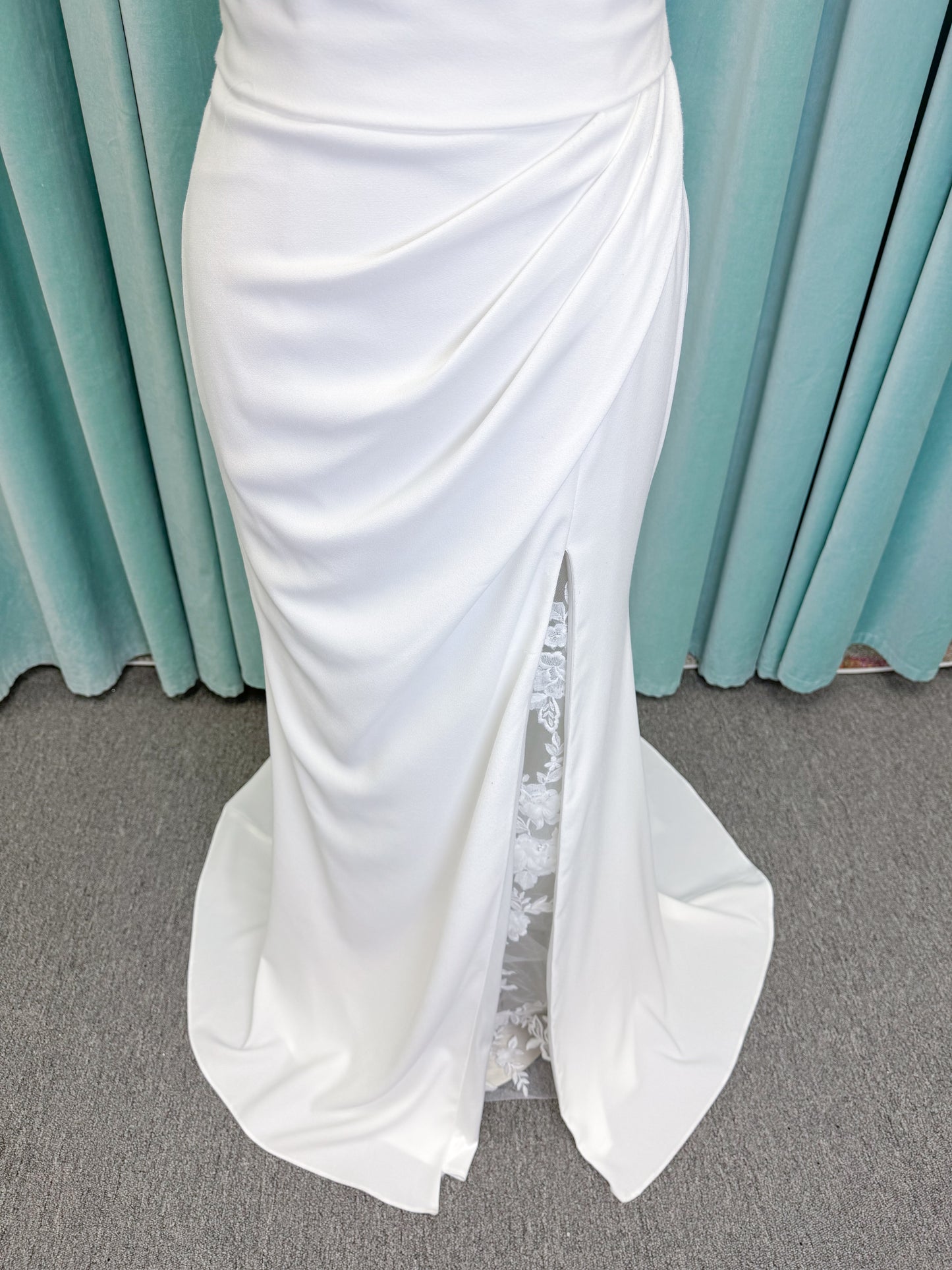 Drake Sheath Wedding Dress in Ivory, Size 10 — draped neckline, spaghetti straps, low button back, lace slit