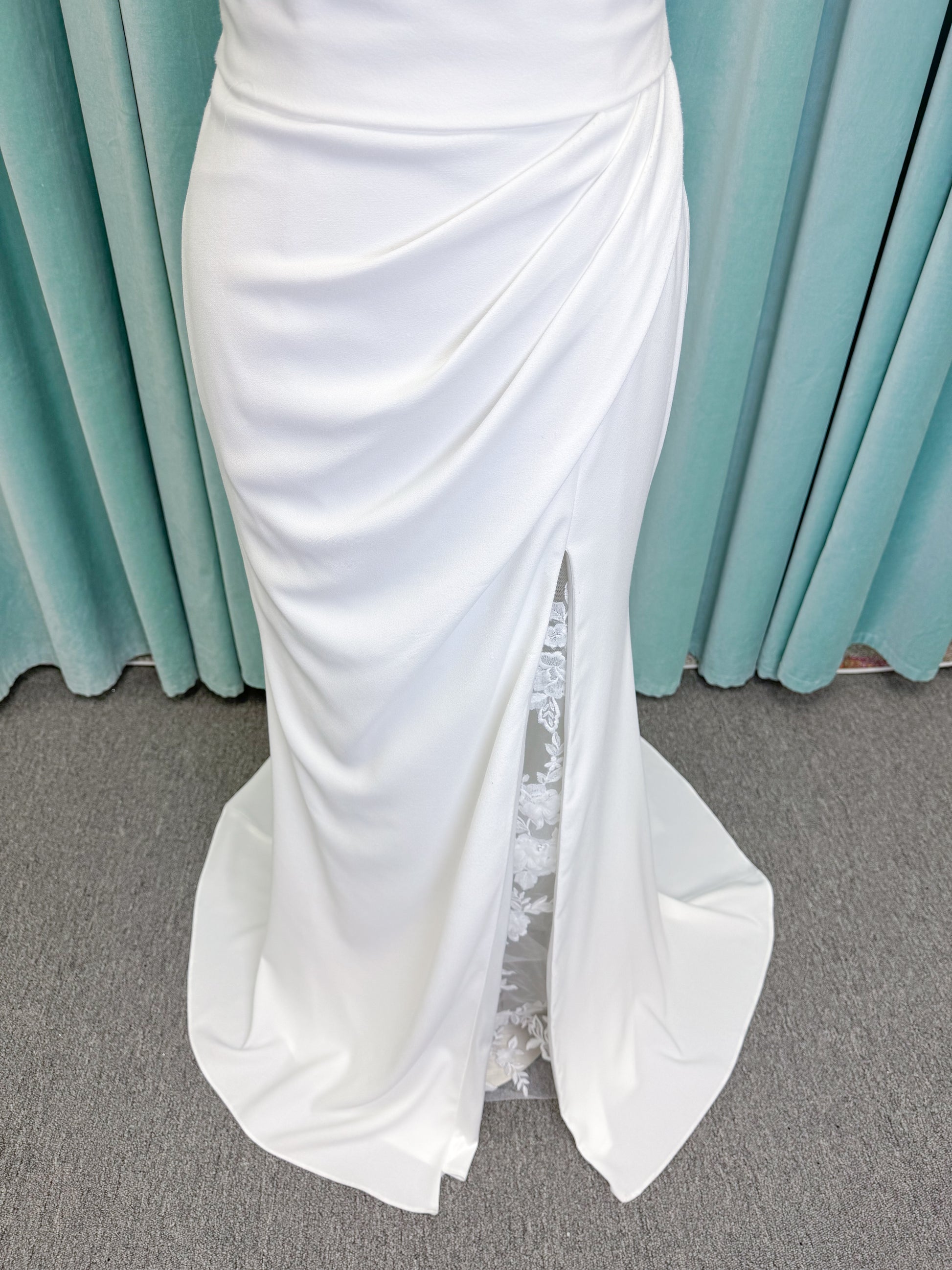 Drake Sheath Wedding Dress in Ivory, Size 10 — draped neckline, spaghetti straps, low button back, lace slit