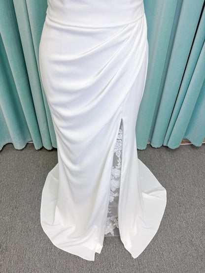 Drake Sheath Wedding Dress in Ivory, Size 10 — draped neckline, spaghetti straps, low button back, lace slit