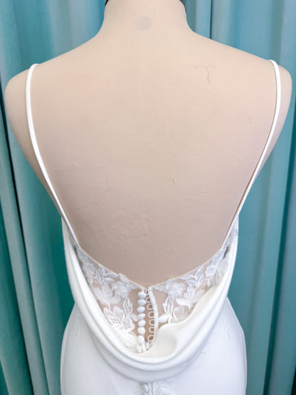Drake Sheath Wedding Dress in Ivory, Size 10 — draped neckline, spaghetti straps, low button back, lace slit