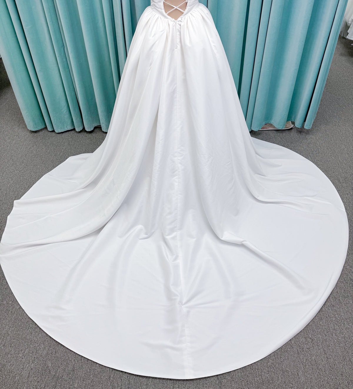 Morilee 1010003 Eleve A-line wedding dress on mannequin with scoop neckline, Chantilly lace peek-a-boo detail, beaded straps, and lace-up corset back