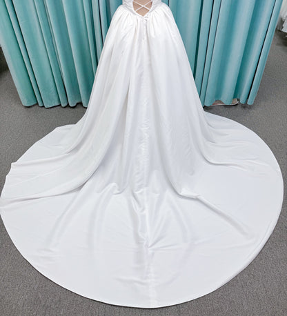 Morilee 1010003 Eleve A-line wedding dress on mannequin with scoop neckline, Chantilly lace peek-a-boo detail, beaded straps, and lace-up corset back