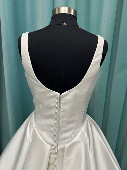 Essense of Australia D4451 Mikado ballgown with V-neckline, wide straps, basque waist, and full pleated skirt