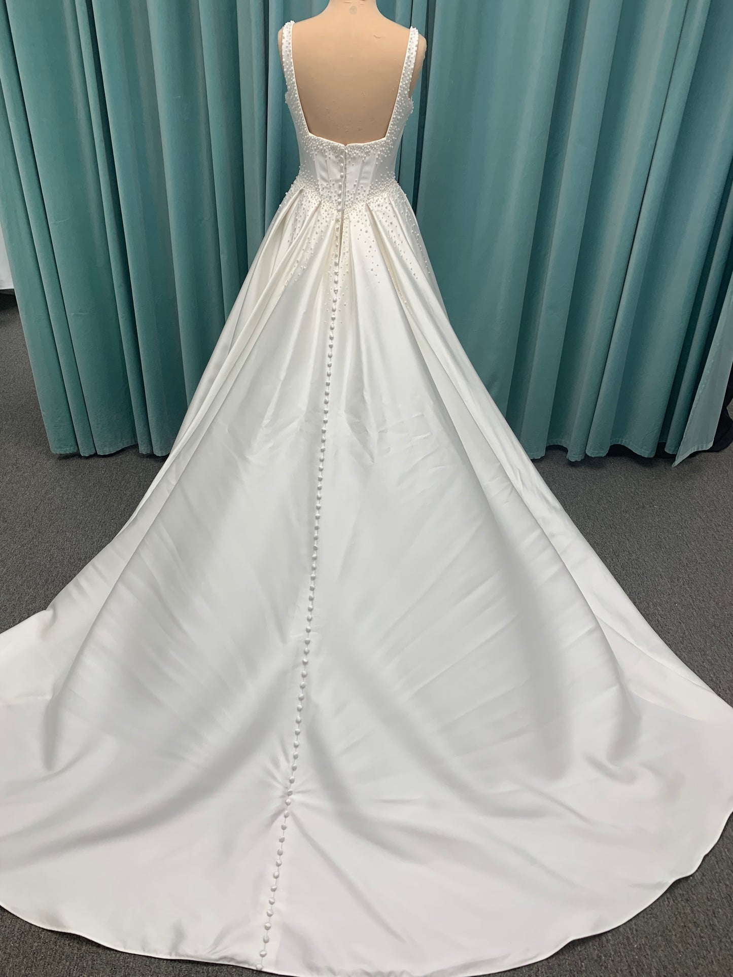 Essense of Australia D4418 Mikado ballgown with draped square neckline, ruched bodice, cascading pearl straps, and full pleated skirt