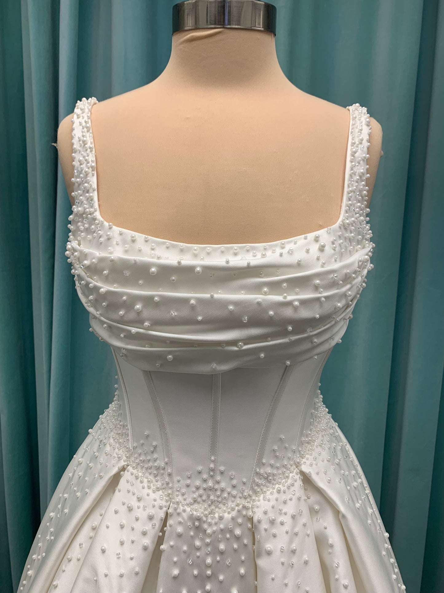 Essense of Australia D4418 Mikado ballgown with draped square neckline, ruched bodice, cascading pearl straps, and full pleated skirt