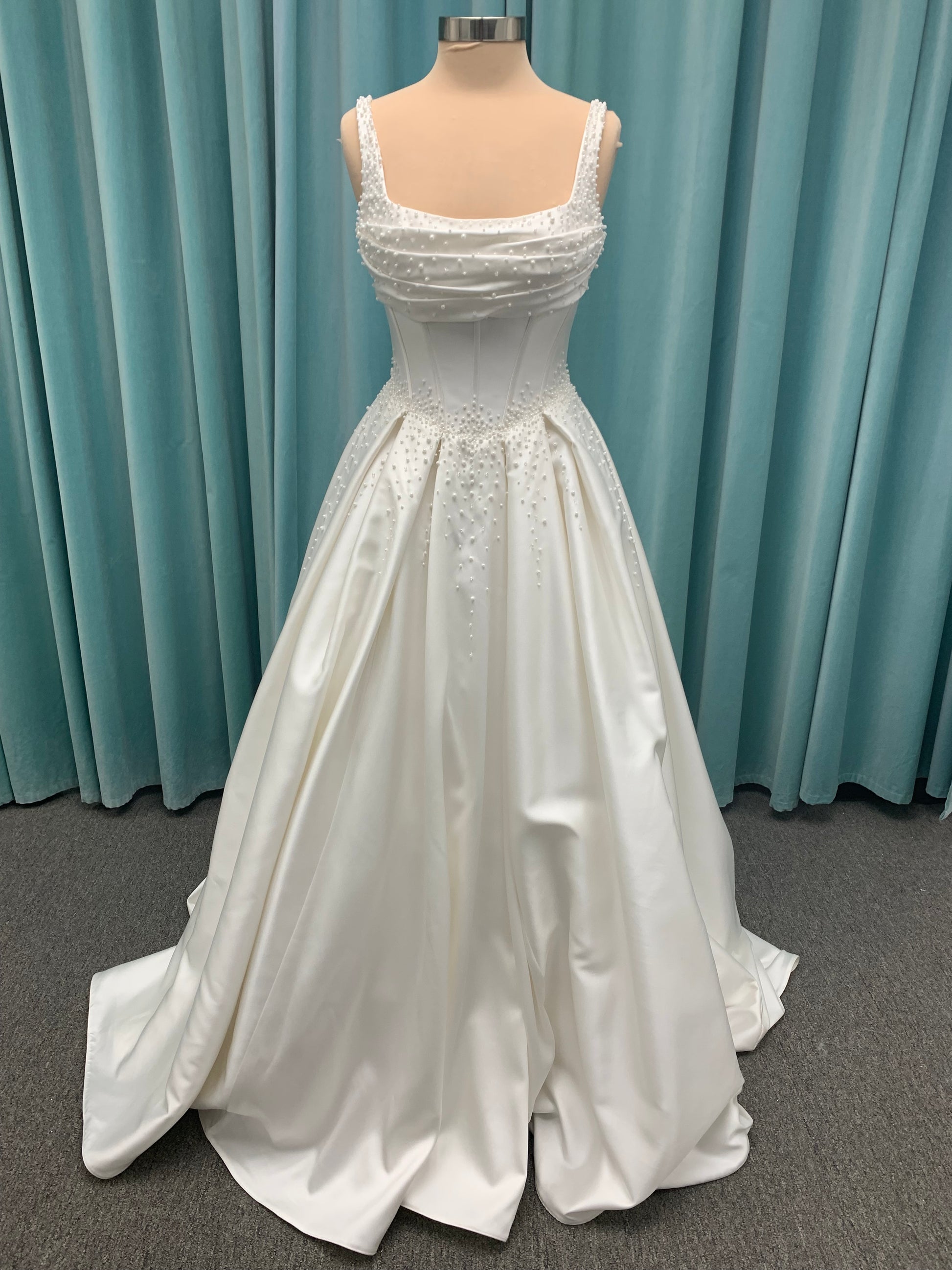 Essense of Australia D4418 Mikado ballgown with draped square neckline, ruched bodice, cascading pearl straps, and full pleated skirt