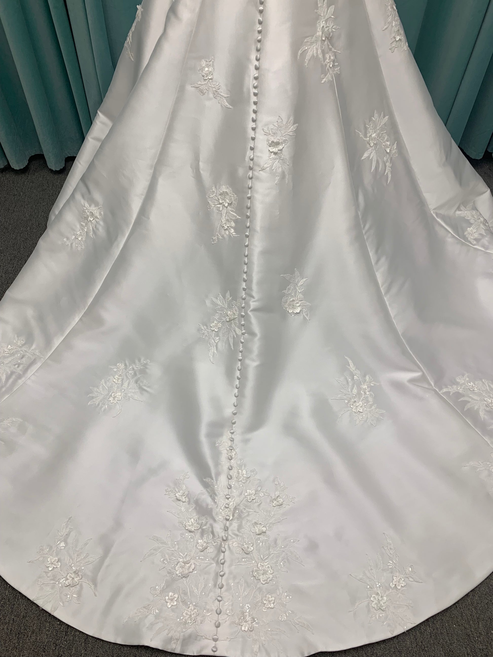 Strapless Mikado A-line wedding dress with straight neckline, lace detailing, and full skirt with hip volume by Essense of Australia Style D4479
