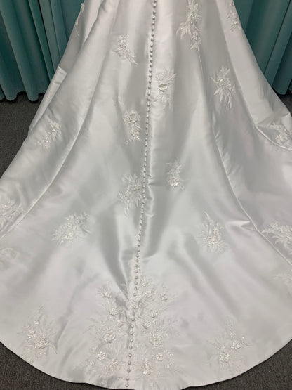 Strapless Mikado A-line wedding dress with straight neckline, lace detailing, and full skirt with hip volume by Essense of Australia Style D4479