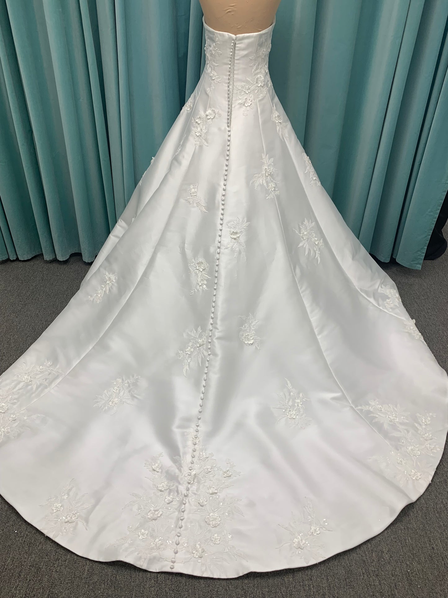 Strapless Mikado A-line wedding dress with straight neckline, lace detailing, and full skirt with hip volume by Essense of Australia Style D4479