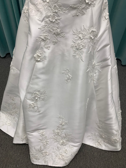 Strapless Mikado A-line wedding dress with straight neckline, lace detailing, and full skirt with hip volume by Essense of Australia Style D4479