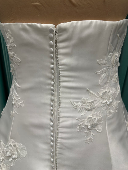 Plus Size Strapless Mikado A-line wedding dress with straight neckline, lace detailing, and full skirt with hip volume by Essense of Australia Style D4479